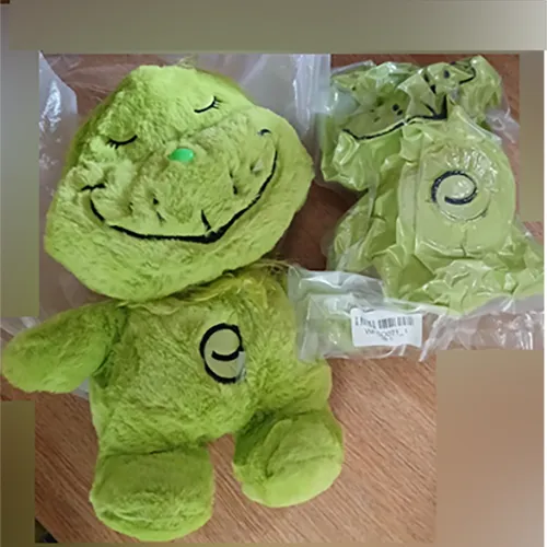 Green Grinch-like Plush Toy